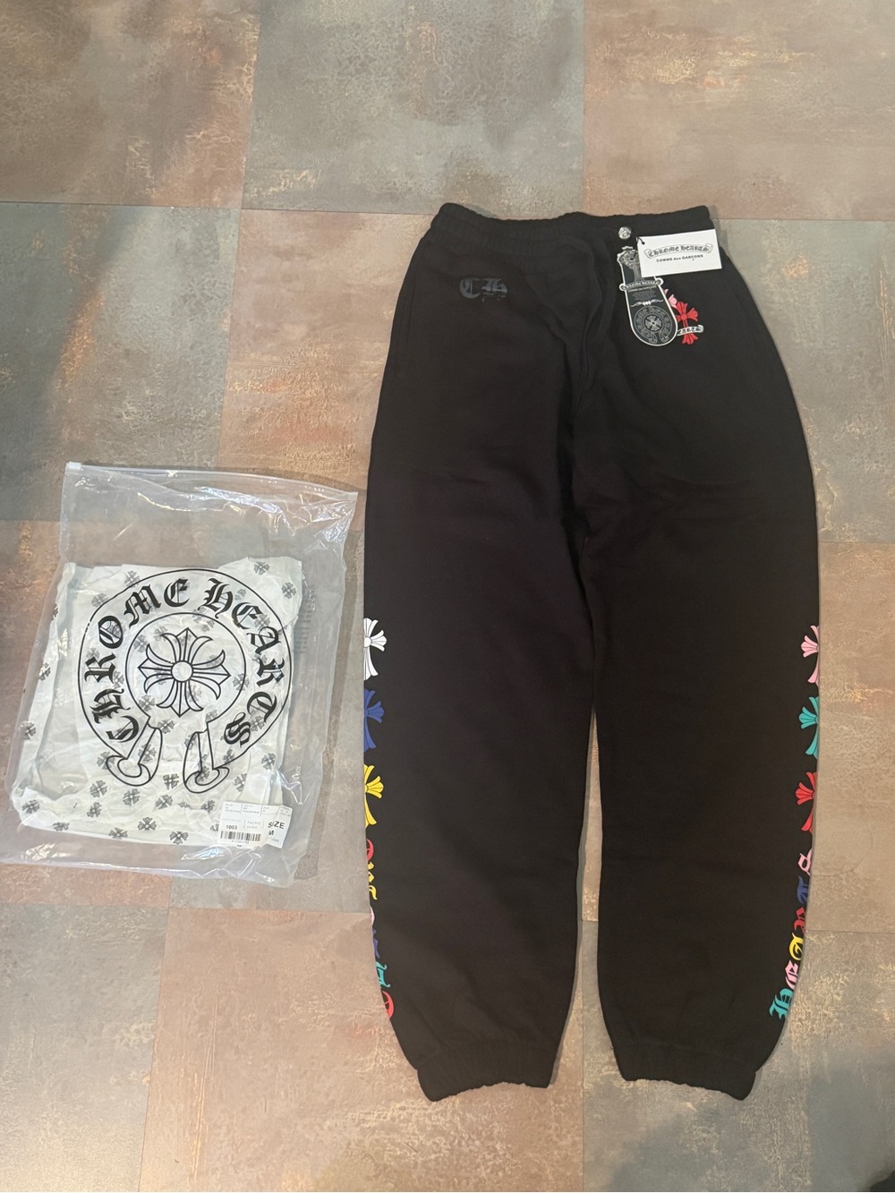 Comme des Garcons Black Sweatpants with Multicolor Flower Accents